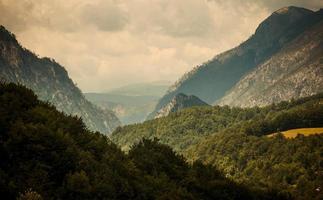 Mountain range and forests of Tara river gorge canyon, Montenegro photo
