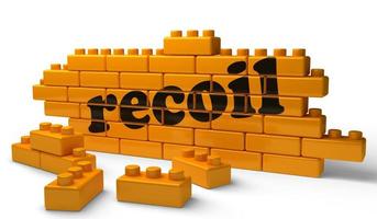 recoil word on yellow brick wall photo