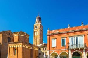 Clock and bell tower of Cathedral Santa Maria Assunta Duomo Roman catholic church building in Chioggia photo