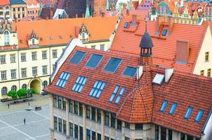 Top aerial view of buildings with tiled roofs, New City Hall and Rynek Market Square photo