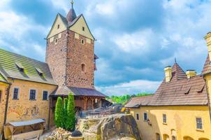 Courtyard of medieval Loket Castle Hrad Loket gothic style building on massive rock photo