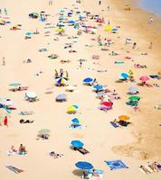 Portimao, Algarve Praia de Rocha beach with tourists photo