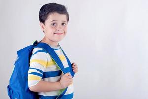 retrato, de, sonriente, colegial, con, mochila foto