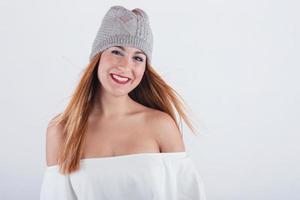 smiling Young woman  with winter hat photo