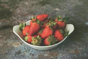 Red Fresh strawberries in a bowl photo