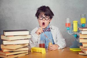 boy is making science experiments photo