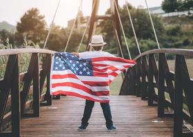 Back view of child with the flag of the United States photo