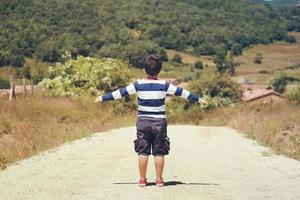 Little boy playing outdoor photo