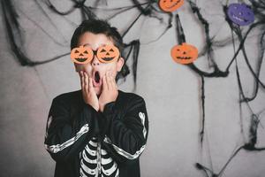 Funny boy at halloween party photo