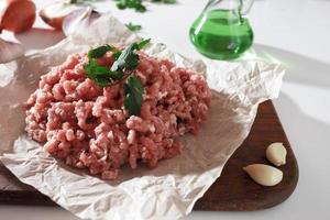 homemade minced pork on parchment paper photo