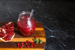 freshly prepared smoothies from banana and pomegranate. Diet, a healthy lifestyle