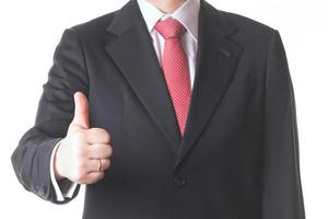 Businessman with thumbs up photo