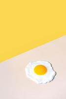 fried egg on a beige background photo