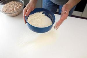 homemade dumplings in the kitchen without decorations. making dumplings with minced pork, beef and chicken photo