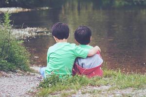 brothers embraced outdoor photo