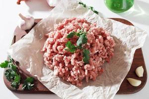 homemade minced pork on parchment paper photo