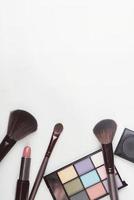 Make-up cosmetics isolated on white background photo