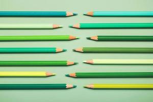 lápices entrelazados en tonos verdes foto