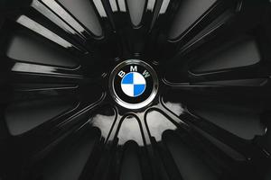 Closeup of BMW logo on car rim