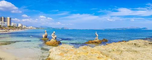Sculptures coast and beach landscape panorama Can Picafort Mallorca Spain. photo