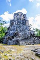 Ancient Mayan site with temple ruins pyramids artifacts Muyil Mexico. photo