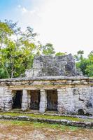 Ancient Mayan site with temple ruins pyramids artifacts Muyil Mexico. photo