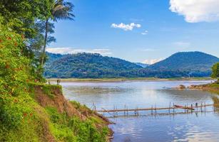 Construction of Bamboo Bridge over Mekong River Luang Prabang Laos. photo