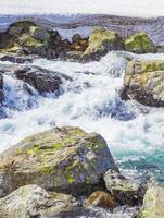 Beautiful Storebottane river vavatn lake with snow Hemsedal Norway. photo