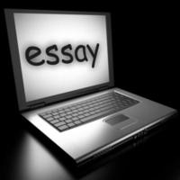 essay word on laptop photo