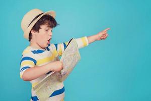 boy with hat and map photo