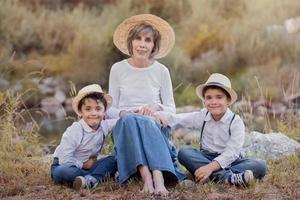 Grandmother with her grandchildren photo