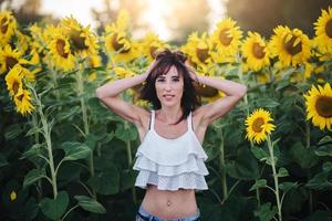 girl in the field of sunflowers outdoor photo