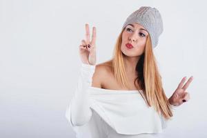 smiling Young woman  with winter hat photo