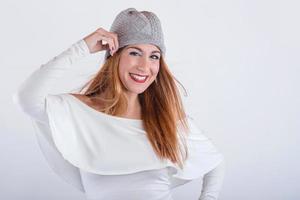 Portrait of young woman with winter hat photo