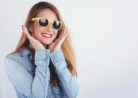 Young woman with sunglasses photo