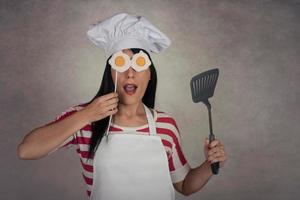 funny woman with fried eggs in his eyes photo