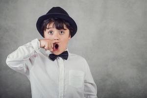 funny boy with hat and bow tie photo