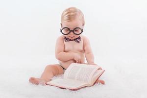 Baby reading a book photo