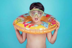 happy child smiling with float ring photo