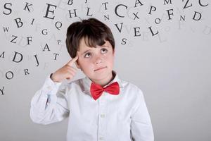 thoughtful child on white background photo