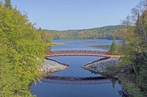 Graceful Footbridge by a North Woods Lake photo