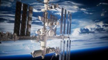 A view of the Earth and a spaceship. ISS is orbiting the Earth video