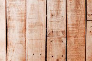 Wood texture background, weathered brown plank from barn photo