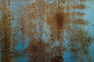 Grunge rusty metal texture. Rusted and oxidized background. photo