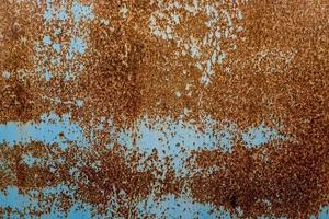 Grunge rusty metal texture. Rusted and oxidized background. photo