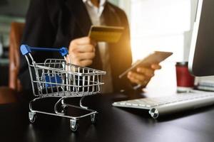 Business woman hands holding credit card photo