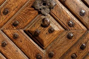 close-up image of an wooden ancient door photo