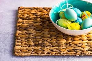 Easter frame concept with daffodils and eggs photo
