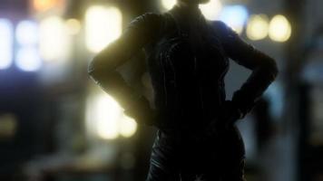 Futuristic cyberpunk style young woman with neon bokeh lights video