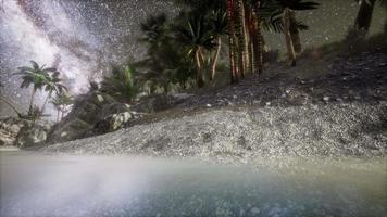 Beautiful fantasy tropical beach with Milky Way star in night skies video